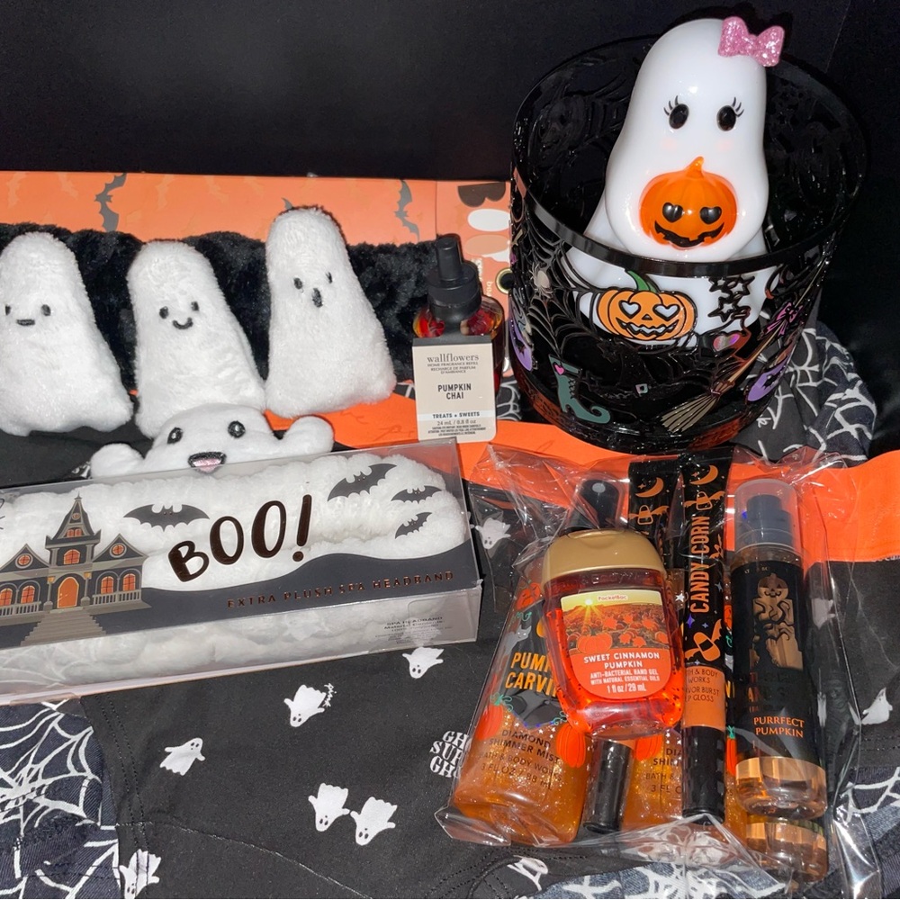 Bath & Body Works candy corn lip glosses, spa headbands and sanitizer set
